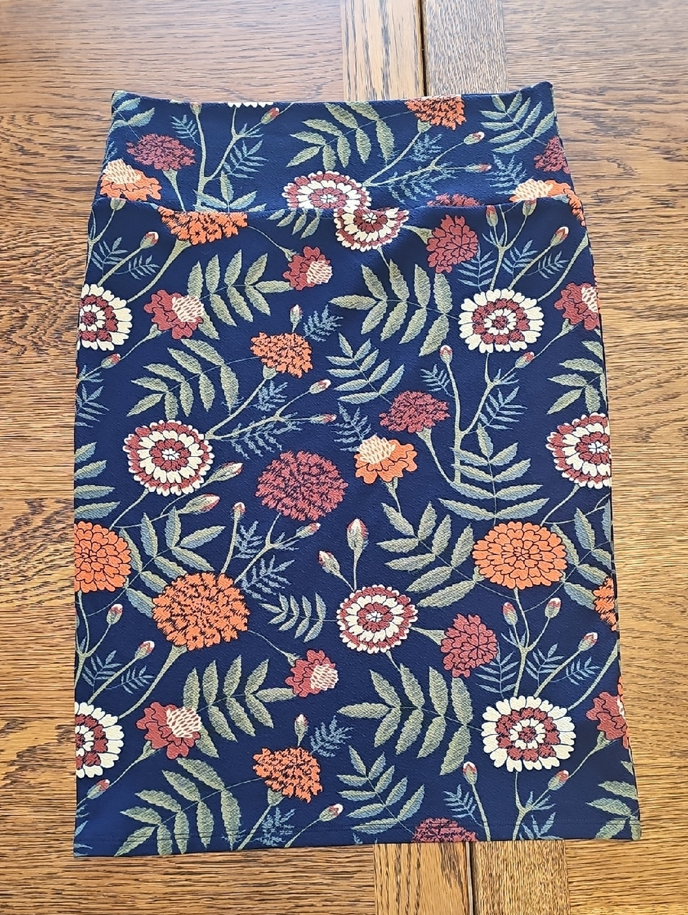 LuLaRoe Navy Pencil Skirt with Orange, Cream & Green Floral Print